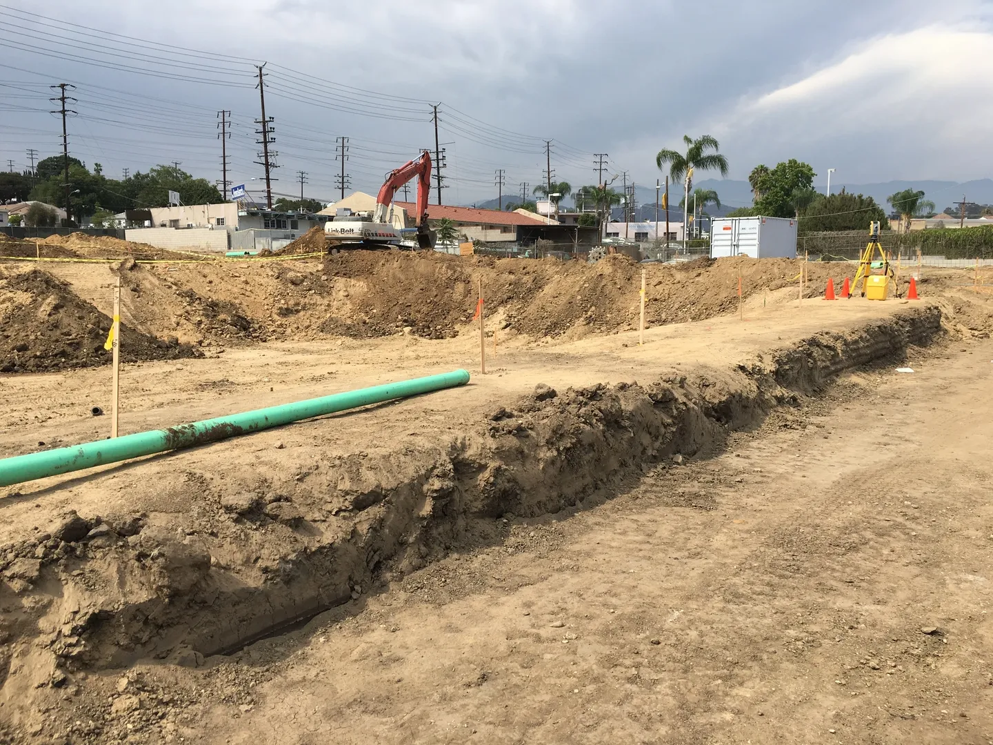 a blue pipe laid on a construction site